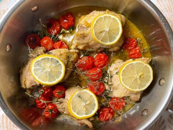crispy chicken thighs with cherry tomatoes