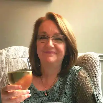 Patty Maguire raising a glass of wine Patty Maguire raising a glass of wine