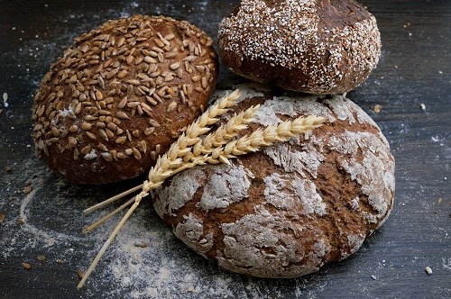 3 loaves of artisan bread with wheat strands