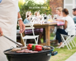 barbecue guide barbecue with burgers and veggies and people in background