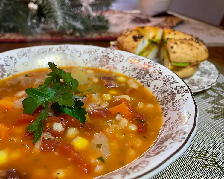 bean and bacon soup with bagel, overhead shot