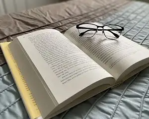 Gluten-Free Books: Open book with glasses on top. Gluten-Free Books: Open book with glasses on top.