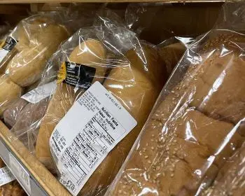 wheat bread on supermarket shelf wheat bread on supermarket shelf