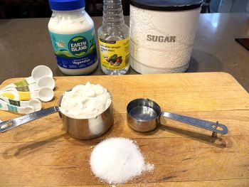 ingredients for broccoli salad dressing: mayonnaise, sugar, vinegar.