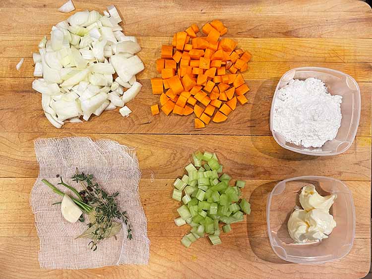 diced onion, carrot celery with flour, butter and spice bag.