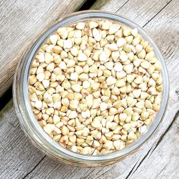 buckwheat in a jar on a rustic background buckwheat in a jar on a rustic background