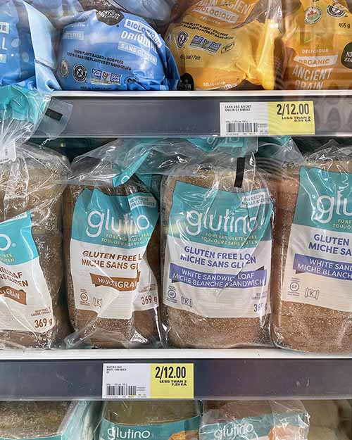 Frozen gluten-free bread in grocers freezer.