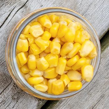 corn in a jar on a rustic background