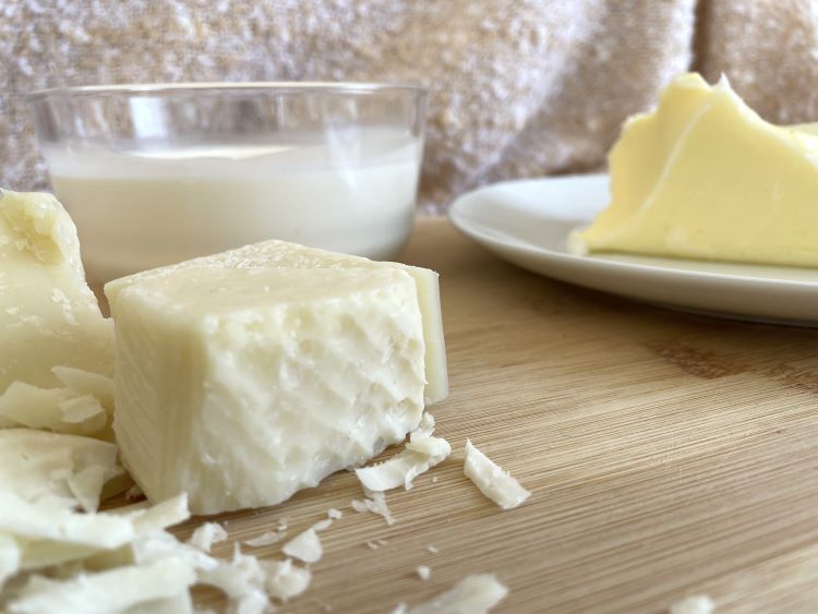cream in a glass bowl, cheese and butter