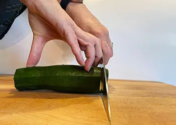 demonstrating hand position for cutting demonstrating hand position for cutting