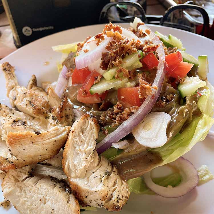 wedge salad with chicken breast at Dunedin Smokehouse wedge salad with chicken breast at Dunedin Smokehouse