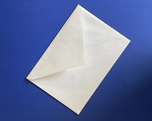 white envelope on blue background