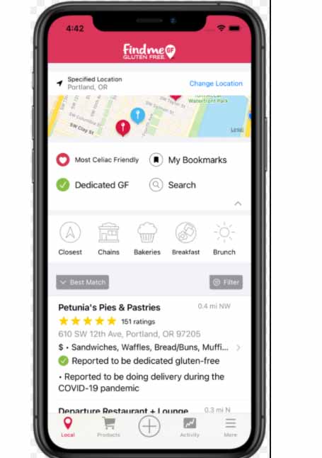 photo of a mobile phone with find me gluten free app. photo of a mobile phone with find me gluten free app.