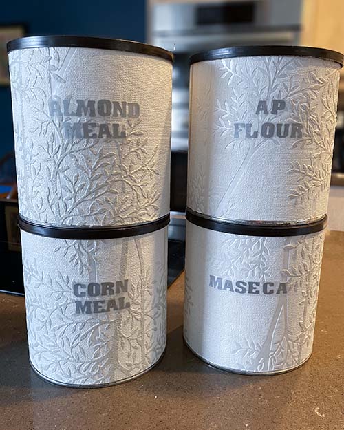 gluten-free flours in recycles coffee cans.  Almond meal, Corn meal, Maseca, and all purpose flour. gluten-free flours in recycles coffee cans.  Almond meal, Corn meal, Maseca, and all purpose flour.