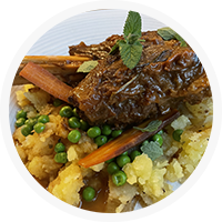 gluten free dinner - braised lamb shanks with mashed potatoes and vegetables.