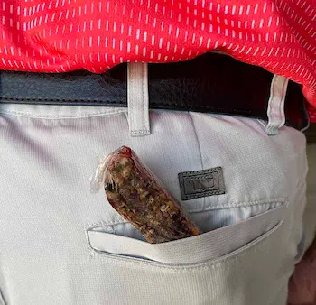 gluten free granola bar sticking out of back pocket gluten free granola bar sticking out of back pocket