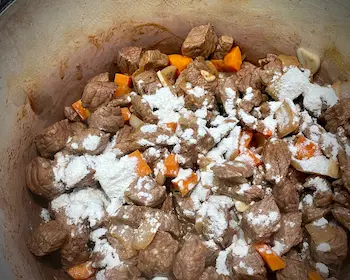 making a gluten-free roux - sautéing meat & veggies with flour