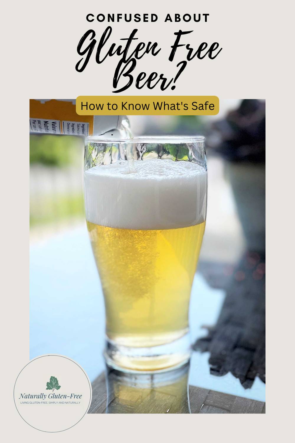 Pin Image - glass of gluten free beer on glass table.