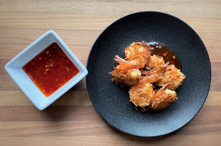coconut shrimp with sweet thai sauce in side bowl coconut shrimp with sweet thai sauce in side bowl