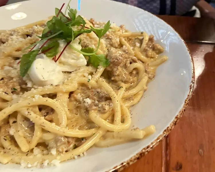 gluten free pasta with white sauce on a decorative plate gluten free pasta with white sauce on a decorative plate