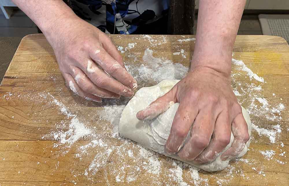 gluten-free pizza.  hands kneading pizza dough. gluten-free pizza.  hands kneading pizza dough.