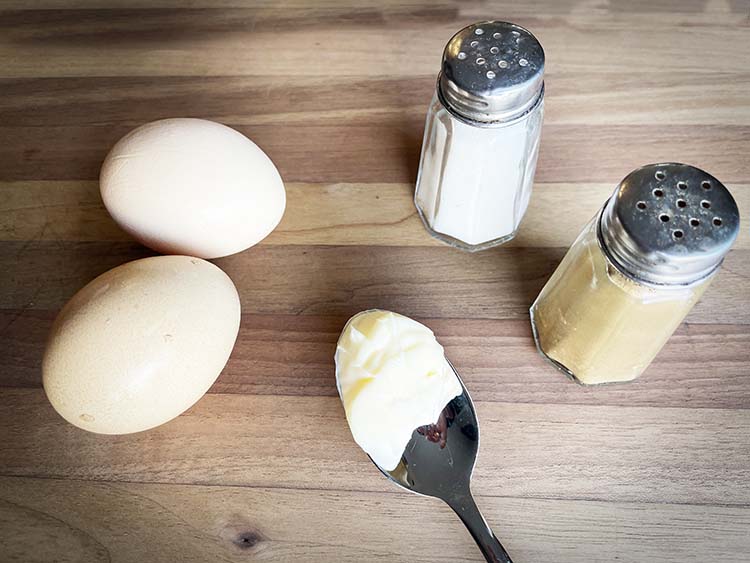 omelet ingredients - two eggs, butter, salt, pepper