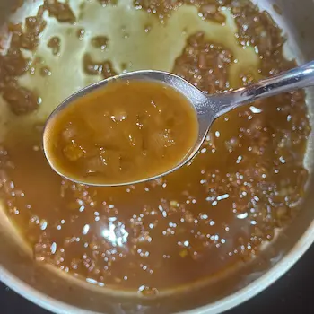 finished pan sauce with spoon