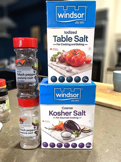 table salt. kosher salt, black peppercorns and ground black pepper table salt. kosher salt, black peppercorns and ground black pepper