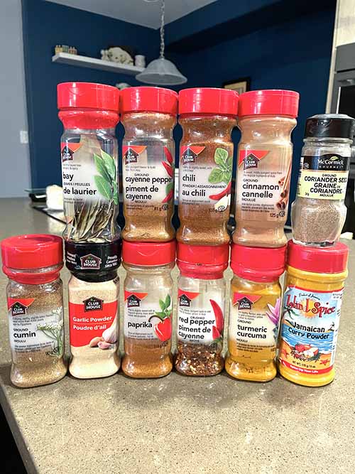 variety of spices stacked on kitchen counter variety of spices stacked on kitchen counter