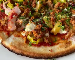 whole pineapple pizza close up