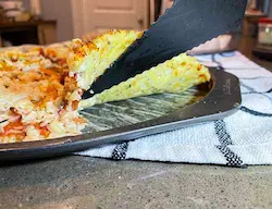 Lifting the edge of rice crust pizza