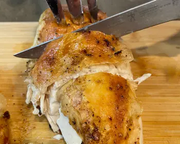 slicing roasted chicken breast