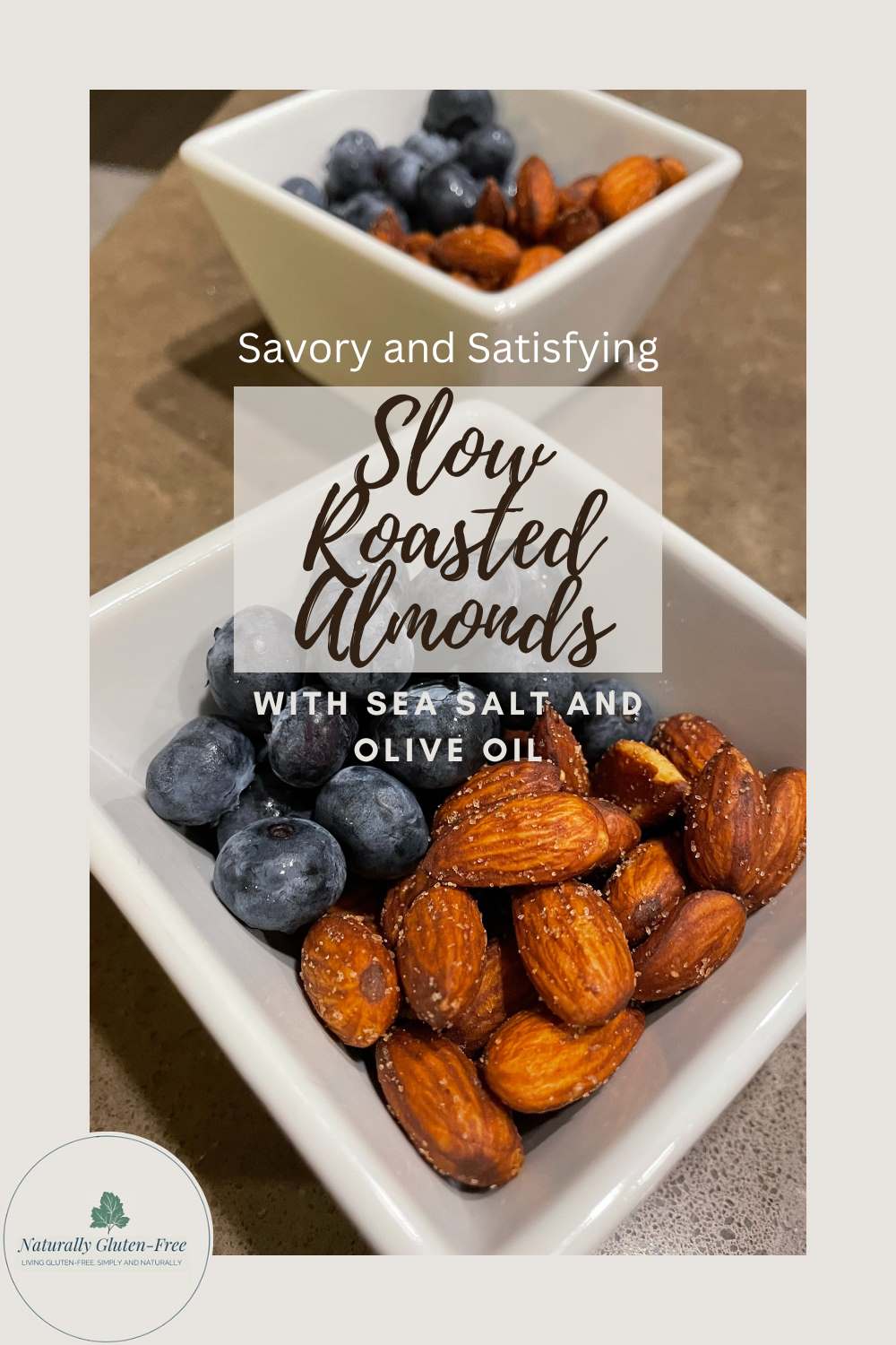 Pinterest image - slow roasted almonds with blueberries in square white bowls