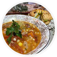 bean and bacon soup in pretty bowl