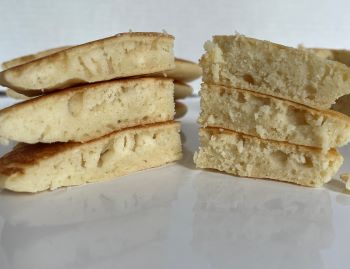 two set of pancakes, one with batter rested and one not