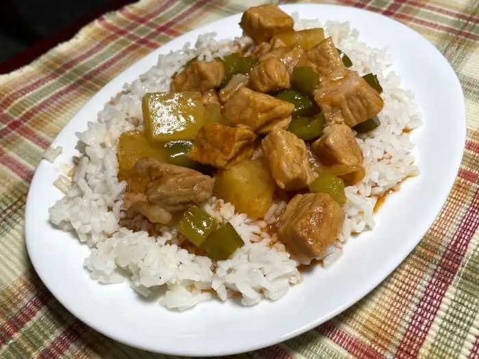 plate of sweet and sour pork with rice