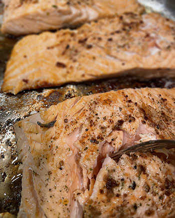 testing salmon for doneness with a fork testing salmon for doneness with a fork