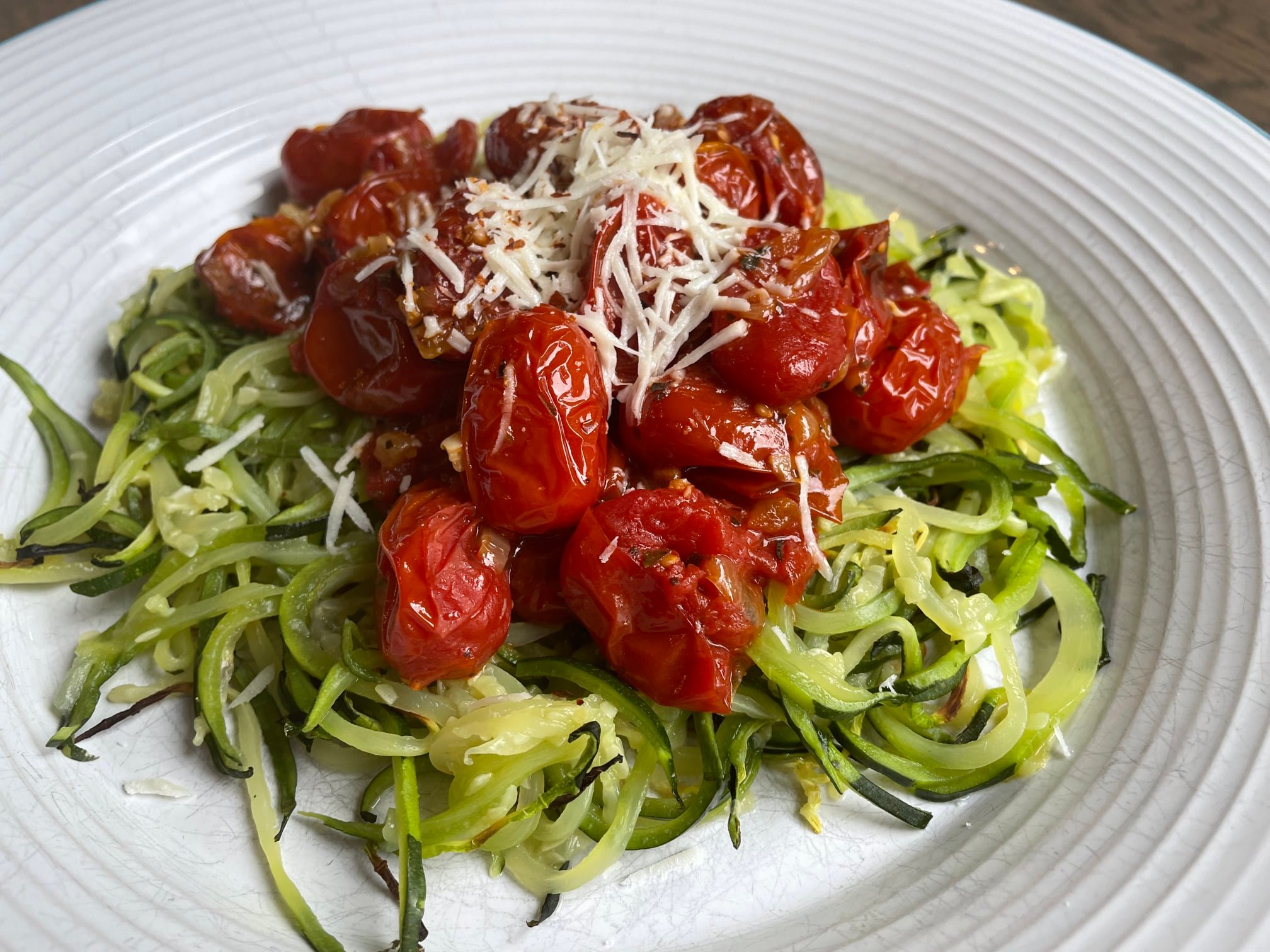 zucchini noodles with roasted cherry tomato sauce. zucchini noodles with roasted cherry tomato sauce.